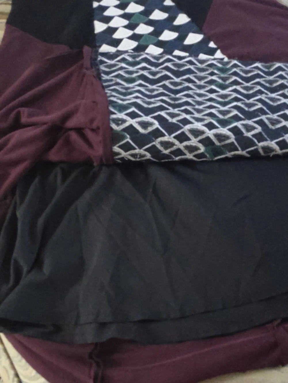 A Line Skirt, Maroon with black at hips and patterned inset. Small.